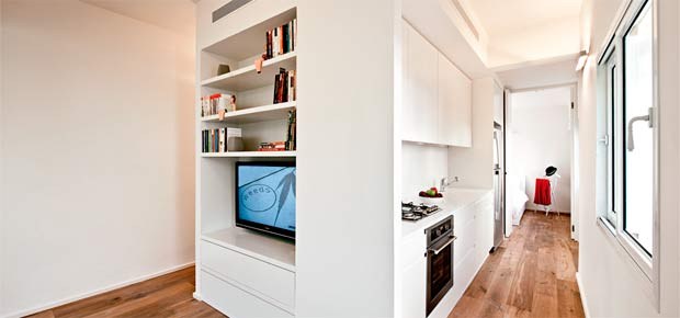 Área multiuso central define apartamento de 40 m² em Tel-Aviv