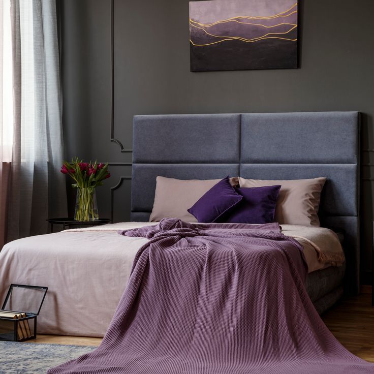 Pink,Blanket,On,Bed,With,Headboard,Against,Grey,Wall,With