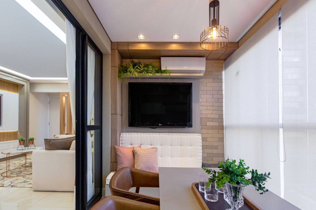 Apartamento de 118 m² ganha varanda gourmet para receber os amigos